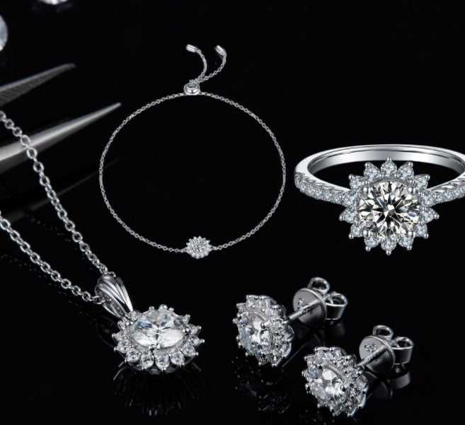 Conjunto de três peças em prata 925: colar, brinco e pulseira