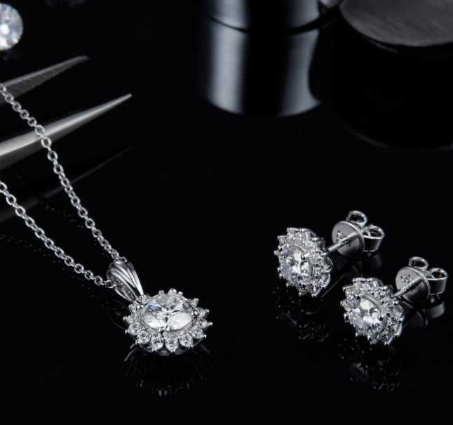 Conjunto de três peças em prata 925: colar, brinco e pulseira