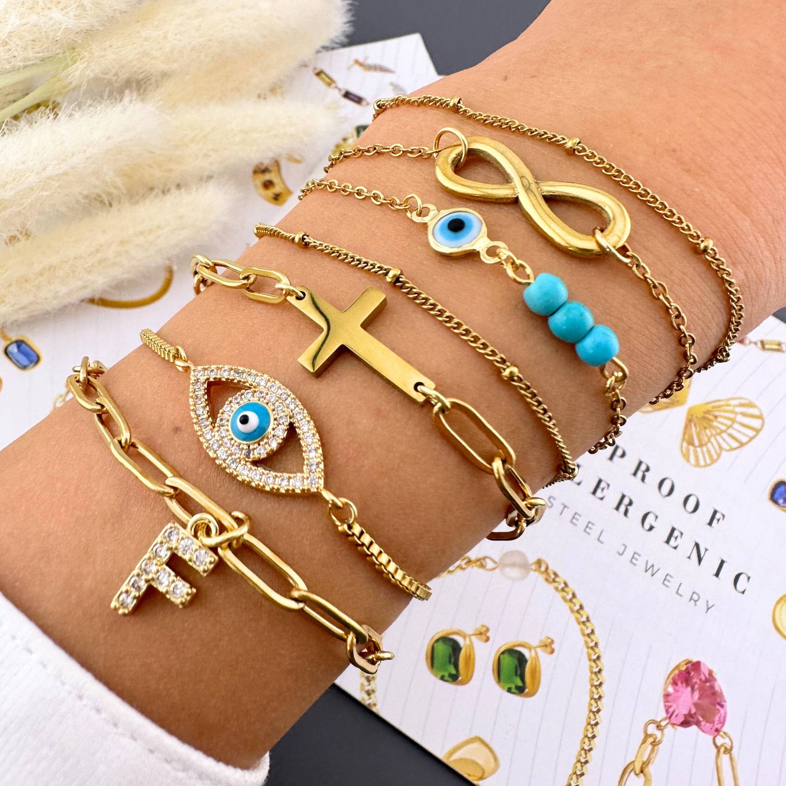 Pulseira "olho grego", Aço Banhado a Ouro 18K