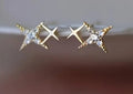 Brinco Estrela dupla com zirconia